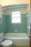 Bath: lots of natural light from east facing window which is frosted for privacy