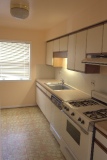 Kitchen: gas range, dishwasher, disposal, large window views east